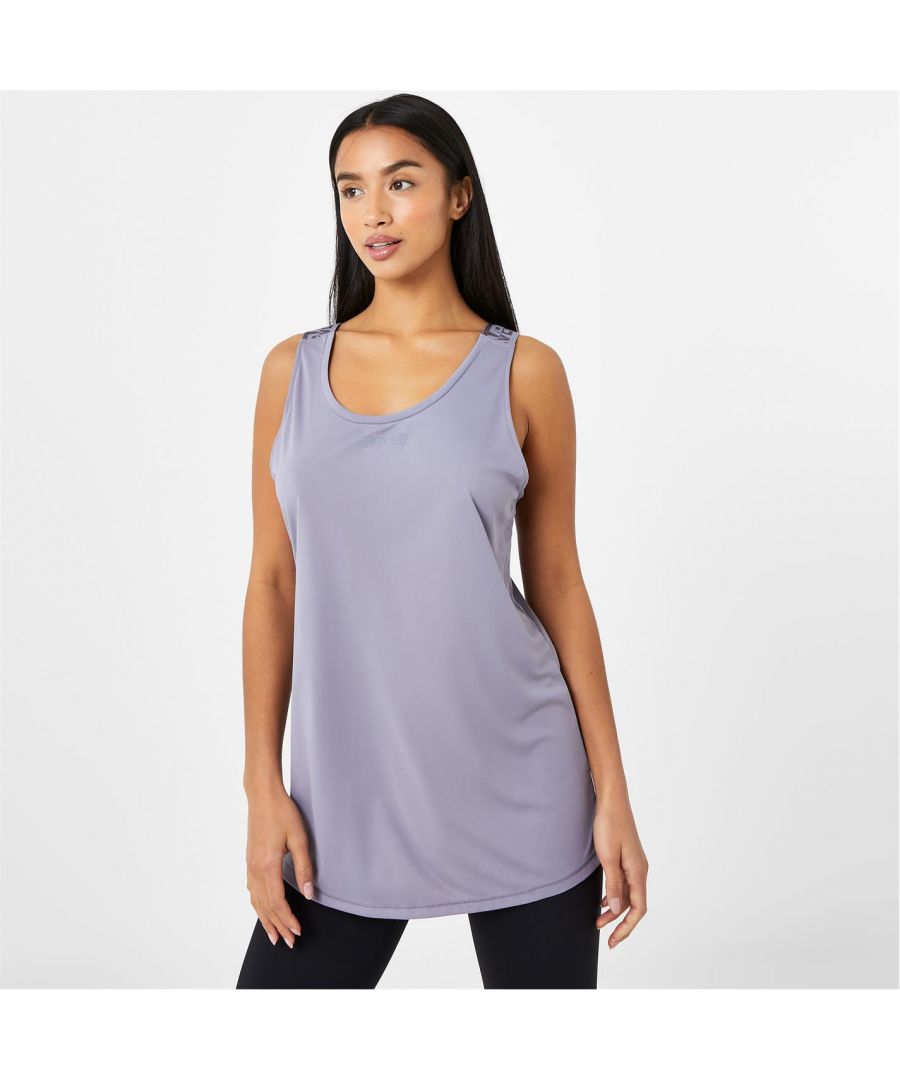 Keep it casual with the Everlast cross back tank top in a regular fit. Its lightweight design provides optimal movement whilst the breathable fabric and sweat wicking technology keeps you dry while you train. Designed with branded tape at the back for a contemporary twist to sportswear.  >Cross back  >Lightweight  >Crew neckline  >New improved fit  >Everdri sweat wicking fabric  >100% Polyester  >Machine washable