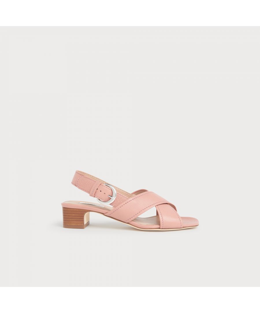 Offering a little height and a lot of comfort, our Noah sandals are perfect for everyday wear during the summer months. Crafted in Italy from soft grainy dusky pink leather, they have crossover straps with stitch detail, a slingback with a large round buckle and small stacked wooden block heel. Wear them with light linen and cotton pieces when the sun shines.