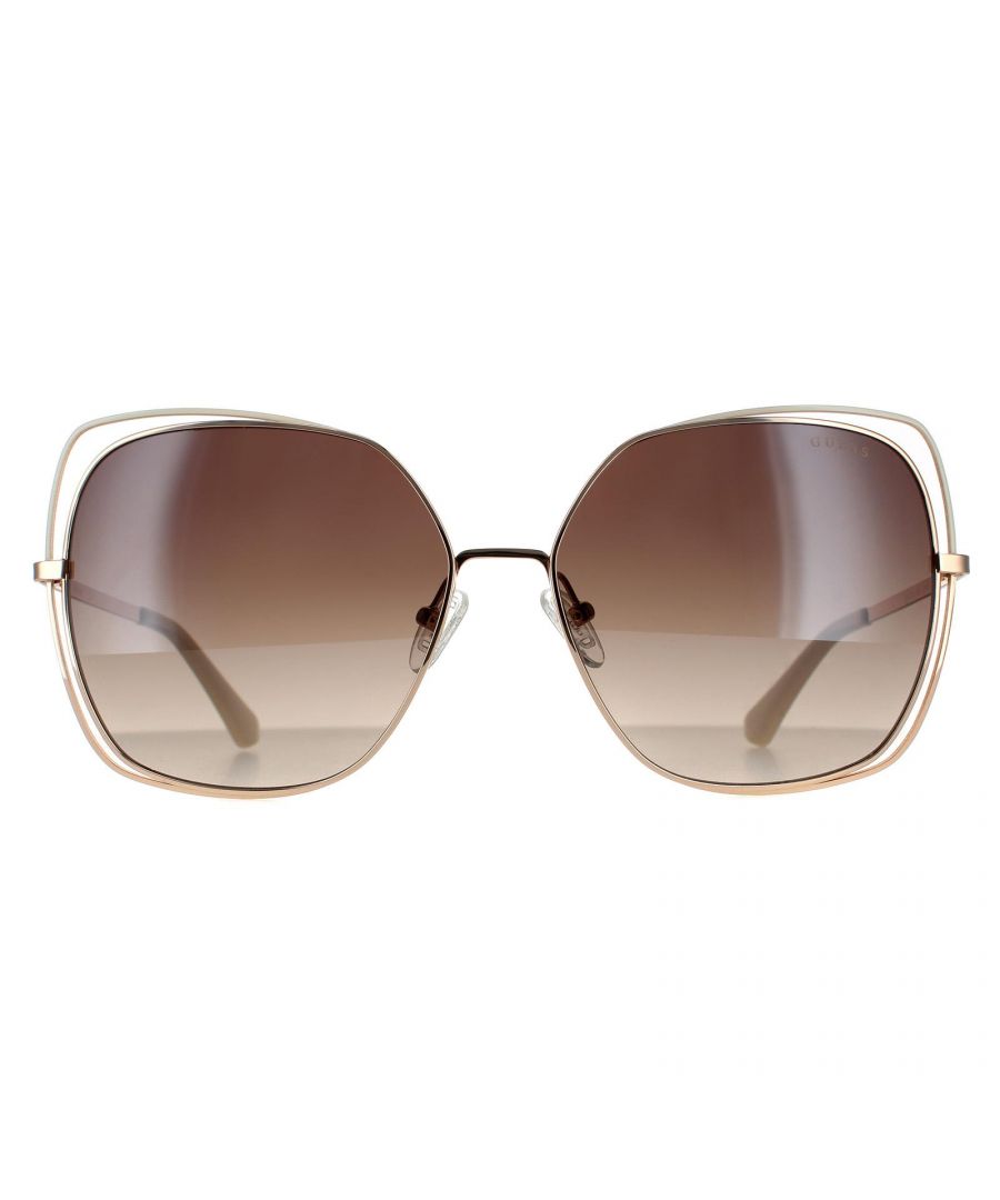 Guess Butterfly Womens Gold Brown Mirror Sunglasses GU7638 are a sleek stylish butterfly style made from  lightweight metal. The adjustable nose pads and plastic temple tips allow for an all day comfortable fit. The Guess emblem logo features on the temples for brand authenticity