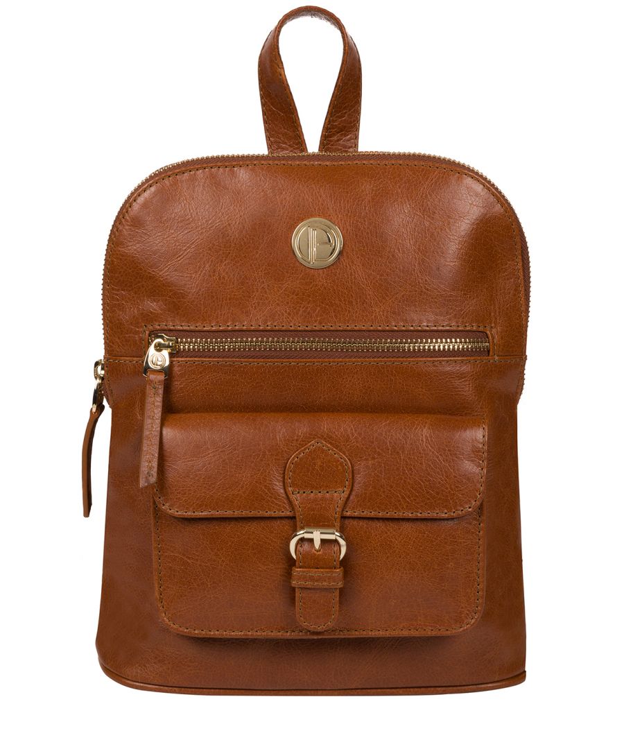 The 'Zinnia' backpack from Pure Luxuries London's Bloomsbury Collection, is crafted from natural leather, featuring gold-coloured metal zips and fittings. Comes with adjustable canvas shoulder straps and a leather grab-handle. On-the-go storage is provided by two pockets on the front of the bag. The zip-round top conceals the central compartment lined with 100% cotton and is complemented by two slip pockets on either side of the interior. Finished with the Pure Luxuries gold plaque.