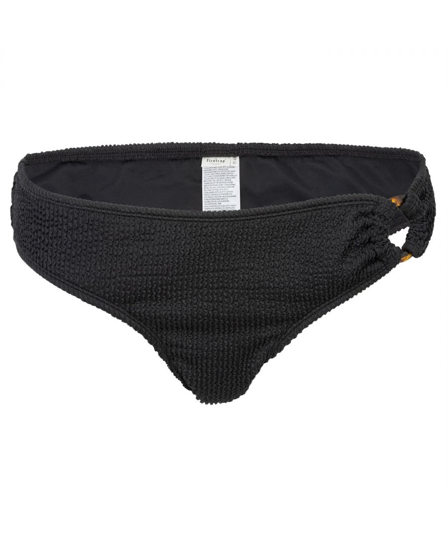 Firetrap Crinkle Tortoiseshell Ring Bikini Bottoms constructed with an elasticated waistband for a secure fit. These bottoms are a solid colour design with a metallic logo with Firetrap branding.