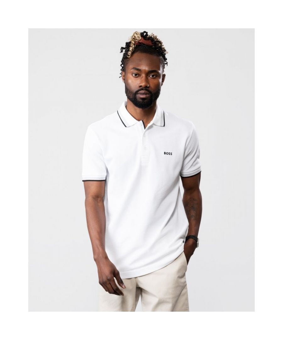 A signature polo shirt by BOSS Menswear, cut to a regular fit. Featuring contrast tipping and a logo at the left chest, this short-sleeved polo shirt is designed in cotton piqué and detailed with further BOSS branding at the undercollar.\nRegular fit. Flat-knit collar. Number of buttons: 3. Short sleeves. Flat-knit cuffs. Standard length. 100% Cotton.\n50469055\nModel is 5