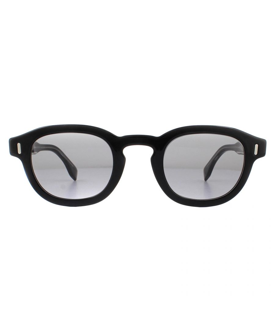 Fendi Sunglasses FFM0100/G/S 08A/IR Black Grey Grey Polarized are a simple round style made from lightweight acetate. The Fendi logo appears prominently on both temples, with the rivet front details completing the look.