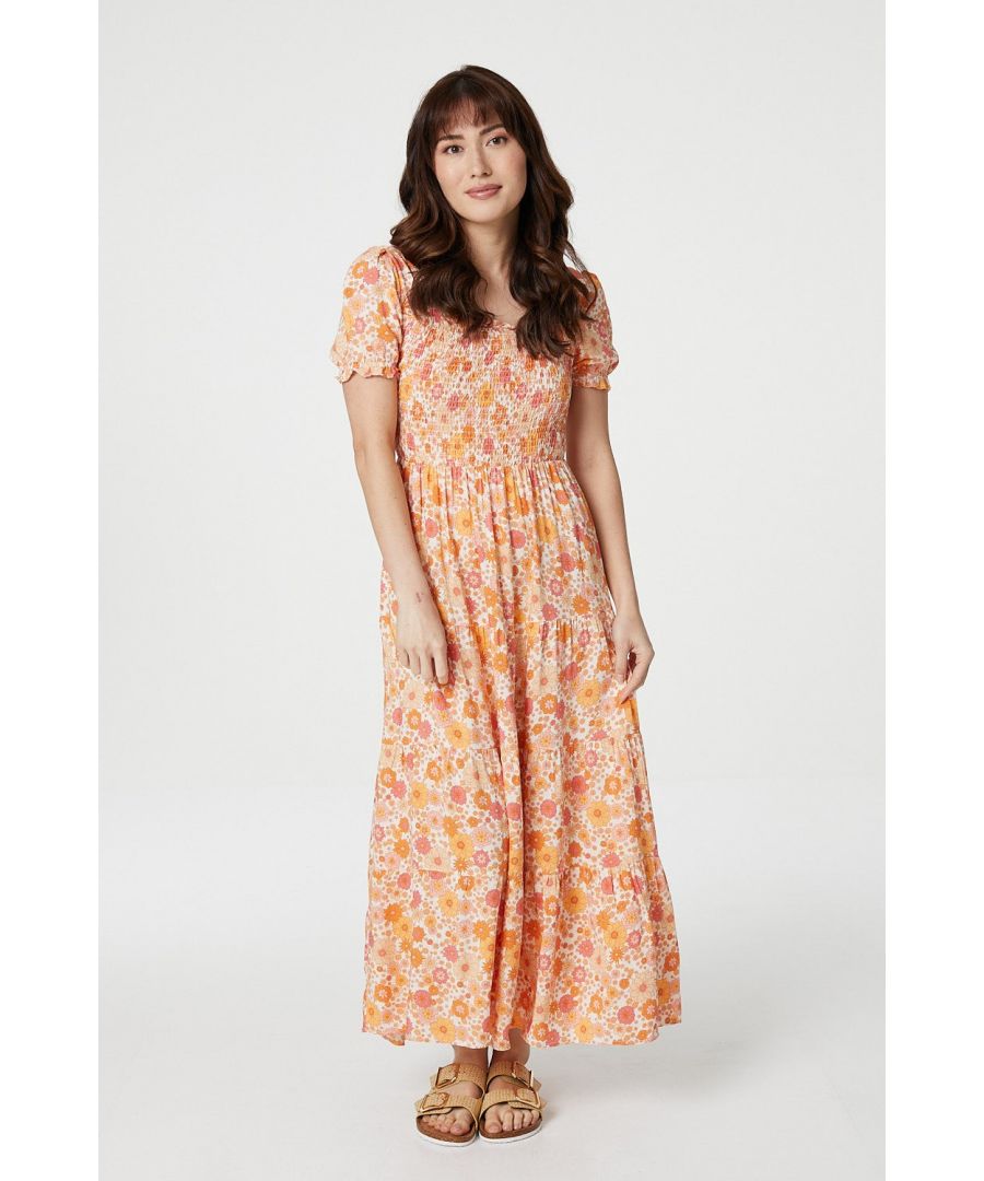 The perfect sunshine ready dress has landed with this floral print maxi dress. With a shirred bodice, short sleeves, a square neckline and a tiered maxi length skirt. Pair with low heels for a casual weekend look.