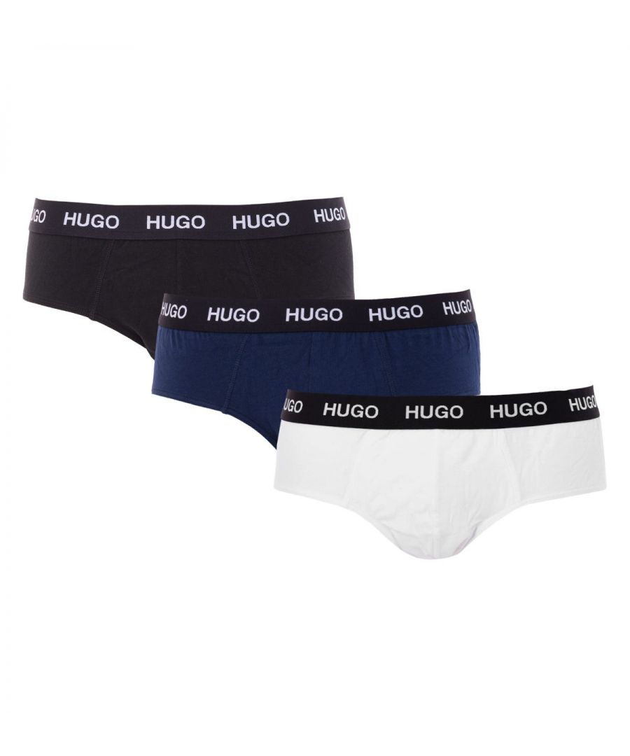 A three pack of classic briefs from HUGO crafted from sustainability sourced stretch BCI cotton. Featuring elasticated waistbands and contrast logo details that not only feels great on your skin, but is great for the planet.BCI - By buying BCI cotton products, you\'re supporting more responsibly grown cotton through the Better Cotton Initiative.Three Pack Low Rise Briefs, Sustainably Sourced Stretch Cotton, Elasticated Waistband, Colours: Black, White & Navy, 95% Cotton & 5% Elastane, HUGO Branding.