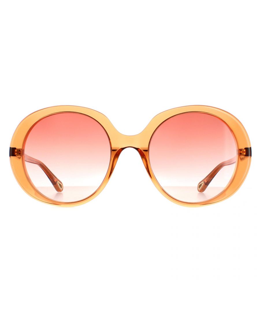 Chloe Oval Womens Transparent Dark Orange Orange Gradient  CH0007S  Sunglasses are a glamorous oval style crafted from lightweight acetate. The Chloe logo is engraved into the slender temples for authenticity.