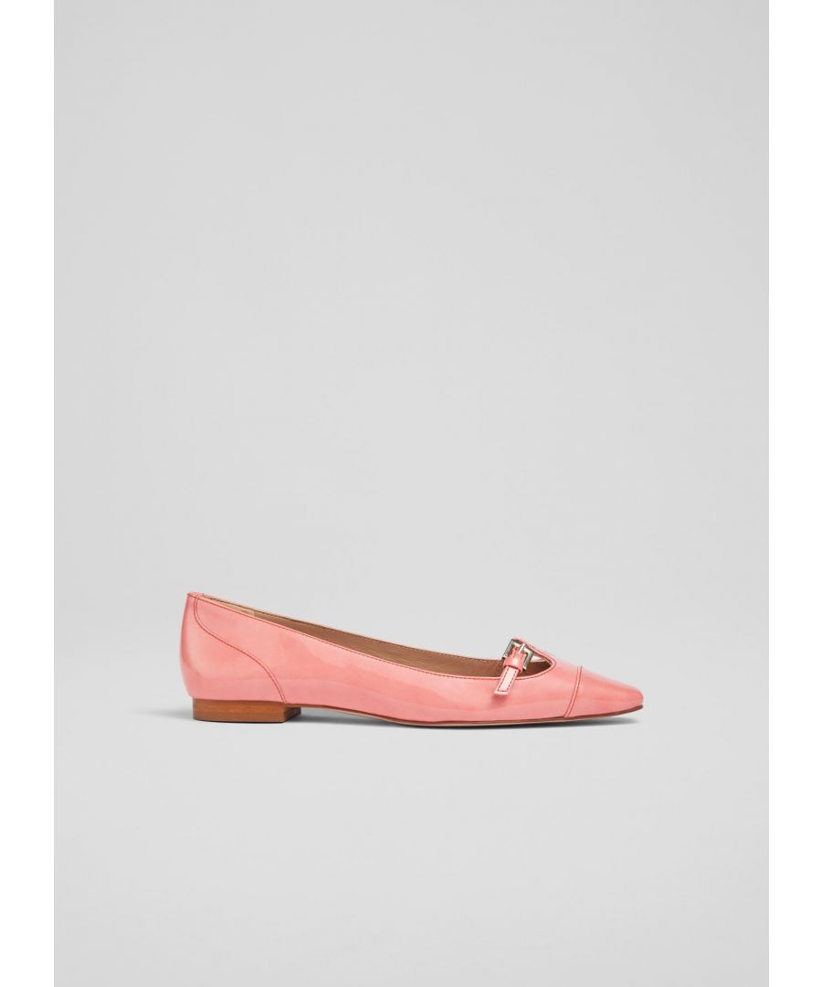 With more than a subtle nod to the 1960s, our Aurora flats have a fun, feminine feel perfect for the spring/summer season. Crafted in Spain from playful salmon pink patent leather, they have a pointed square toe, Mary-Jane style silver buckle detail to the front, a sleek silhouette and a flat heel. Wear them for a flash of fun on sunny spring days.