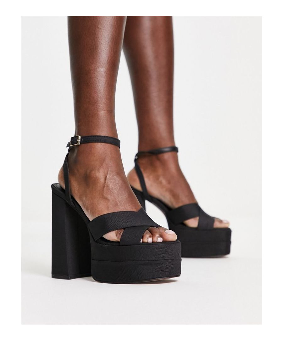 Sandals by ASOS DESIGN Hit new heights Adjustable ankle strap Pin-buckle fastening Open toe Platform sole High block heel Sold by Asos