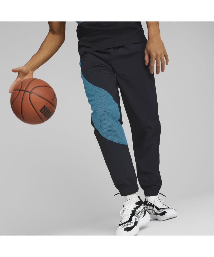 PRODUCT STORY Look as bold as LaMelo Ball plays in these basketball pants. The contrast design details will have you catching all the looks the next time you head to the court. FEATURES & BENEFITS : windCELL: Technology designed to protect against the wind and keep you comfortable during exercise DETAILS : Elasticated contrast waistband with drawcord Adjustable elasticated cuffs Mesh contrast panel inserts on right leg and back Melo branding on left leg PUMA Cat Logo on back right Crinkle finish Regular fit