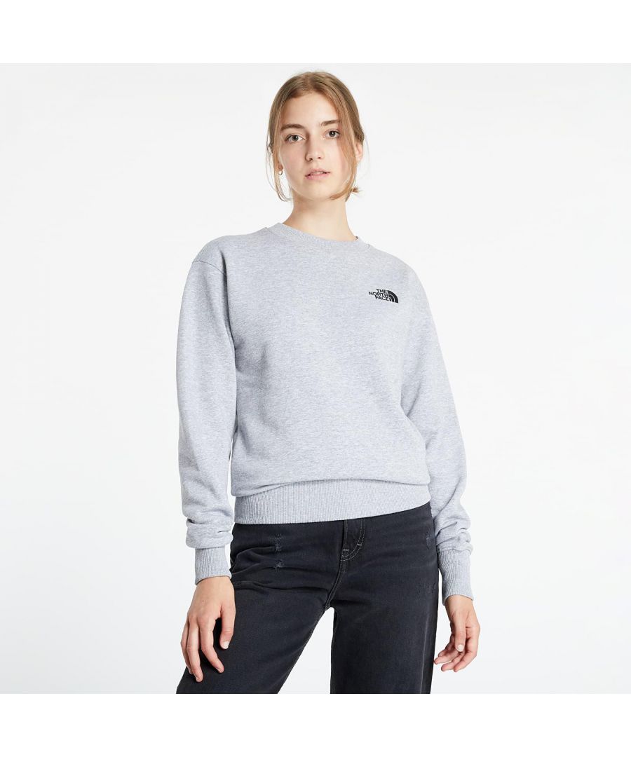 The North Face Womens Essential Oversized Fit Sweatshirt.   \nUltra-comfy Baggy Fit Relaxed and Roomy.   \nThe North Face Brand Embroidery on the Front, Embroidery on the Back.   \nRibbed Hem, Collar and Cuffs.    \nElastic Hem, Crew Neck.   \nDrop Shoulders.  \nLogo Embroidery to Chest and Back.  \nModel Height - 177 Cm Model Wears Size – XS.