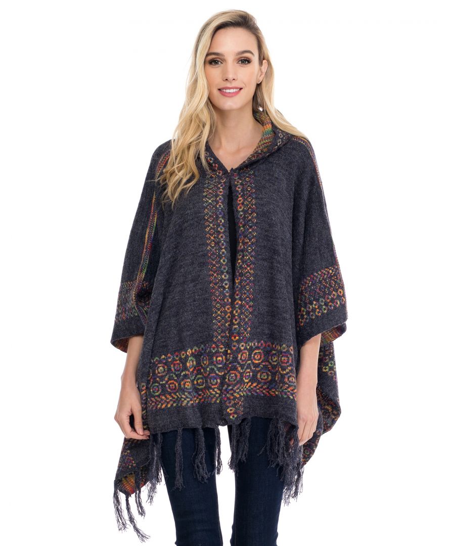 Knitted graphic poncho with hood and tassels