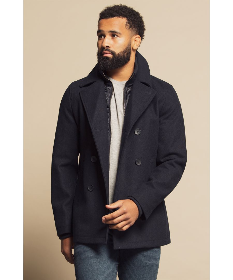 This double-breasted pea coat from French Connection is a wardrobe staple. Features inside zipped funnel, double breasting, lapel, two front pockets and two inside pockets. Perfect for keeping warm in the colder months.