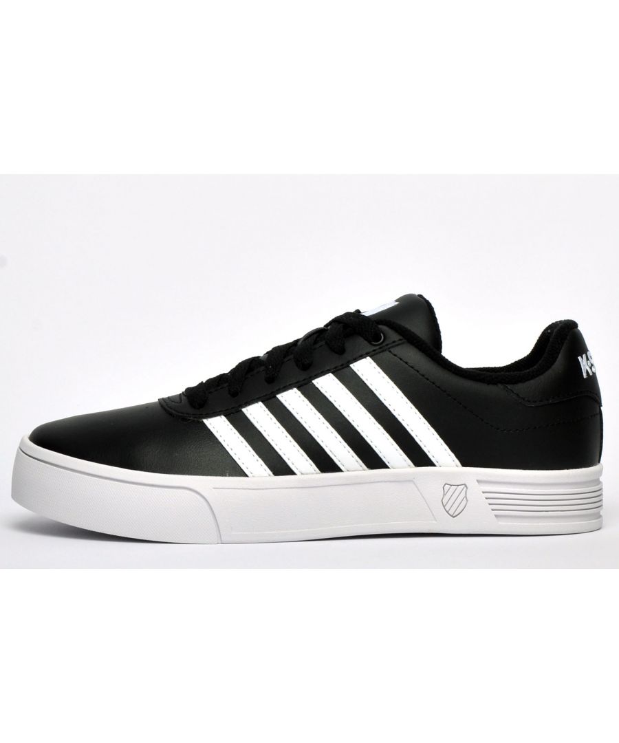 The K Swiss Addison Vulc is a classic low-top trainer constructed in a luxe black premium leather upper with the brand's iconic 5-stripe design adorning the sides with consummate ease, delivering a pristine designer look which anyone would be proud to wear. K Swiss trainers combine quality, style and performance all rolled into one and this K Swiss Addison Vulc is no exception, with its intricate decorative stitch detailing and traditional lace up fastening to keep your feet firmly in place, this is a trainer that will take you from day through to the night in style and comfort.\n - Leather upper \n - Vintage styled silhouette \n - Sumptuous cushioned footbed \n - Up-front lacing system delivers a safe and secure fit \n - Padded heel and ankle collar\n - K Swiss branding throughout