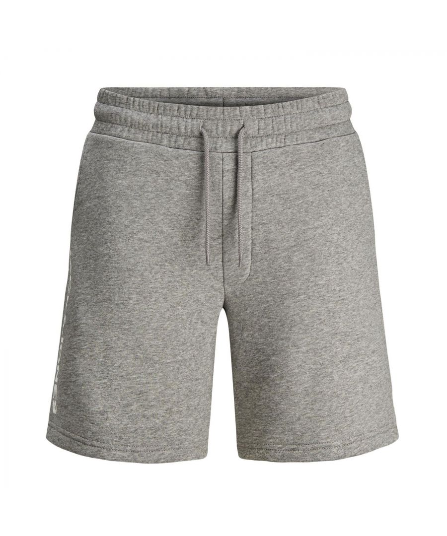 A great little basic to help top up your Summer wardrobe. These Jack and Jones Sweat shorts in navy are an ideal seasonal option that can be teamed with a simple graphic t-shirt and a pair of your favourite trainers for a great everyday casual look.\n\nFeatures: \nSweat shorts with a small logo print\nLoopback for reliable warmth and air circulation\nElastic waistband with drawstring\nUnbrushed\nMaterial: 100% Cotton\n\nWashing Instruction: \nMachine wash at 30°C\nDo not bleach\nTumble dry on low heat settings\n\nIron Temp: High temp. iron. Highest temp. 200°C\n\nNote: Do not bleach, Dry clean (no trichloroethylene)\n\nPackage Includes: Jack&Jones Men's Sweat shorts