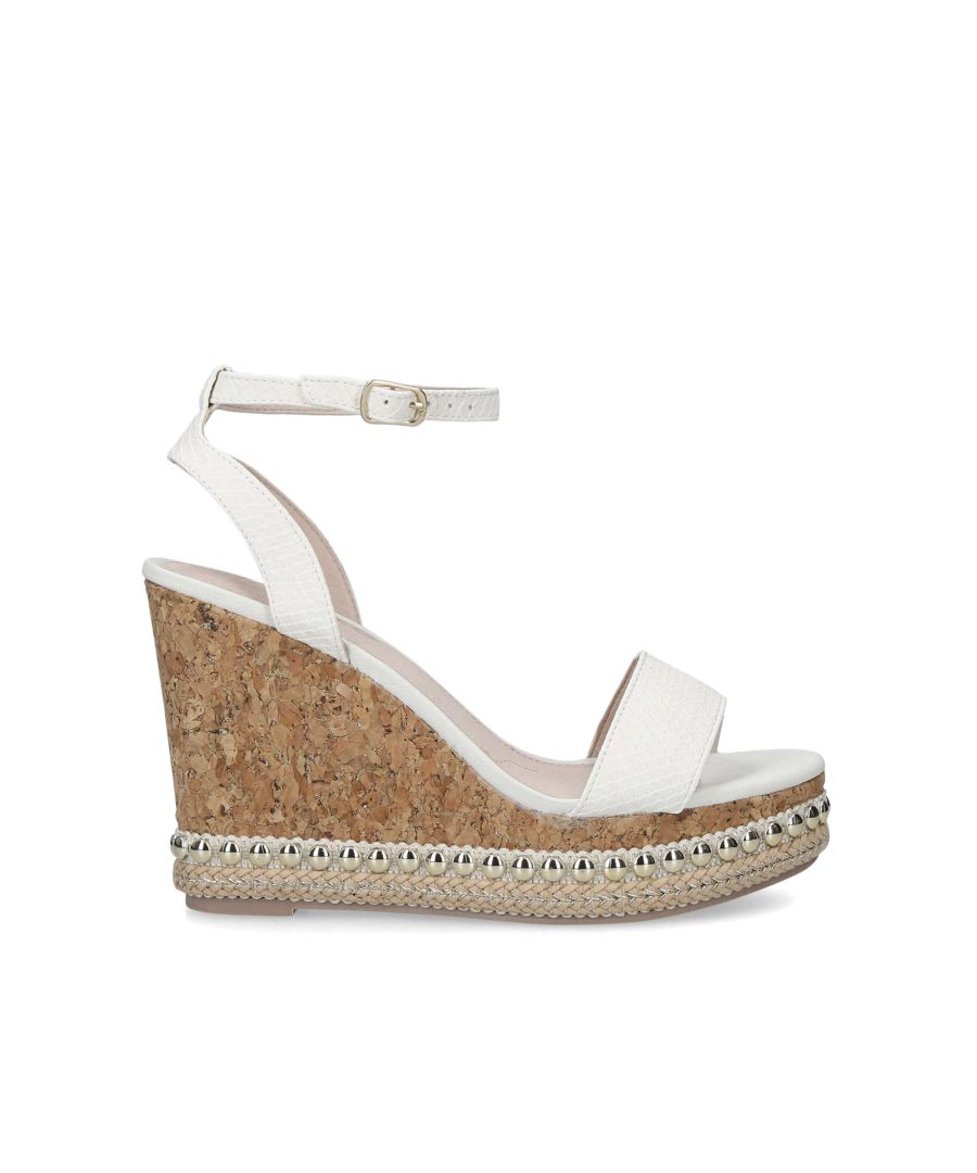 Every wedding-guest wardrobe needs a go-to wedge and Pip by Miss KG has you well and truly covered. Styled with white straps, this cork 95mm-heeled sandal features studs around the sole for a contemporary twist.
