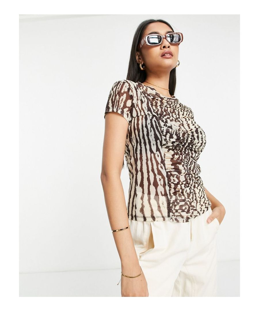 Top by Topshop Cos your jeans deserve a nice top Animal print Crew neck Short sleeves Regular fit  Sold By: Asos