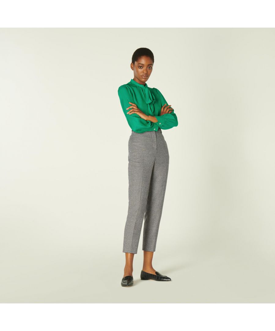 Cut to a slim, tailored fit, our Nina trousers make a beautiful suit when paired with the Nina jacket. Crafted from an Italian wool-blend fabric in a black and white dogtooth check, these ankle-length trousers sit on the waist, have belt loops, side pockets and back slit pockets and are finished with pressed creases. Wear them with a luxe silk shirt whether you're going with or without the matching jacket