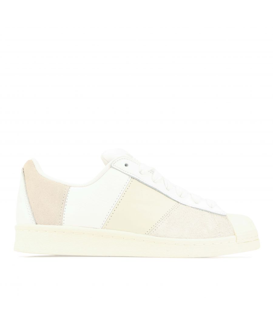Mens adidas Originals Superstar 82 Panel Trainers in off white.- Leather upper.- Lace closure.- Padded ankle collar.- Branding to the tongue.- Leather lining.- Rubber outsole.- Ref.: GY8561