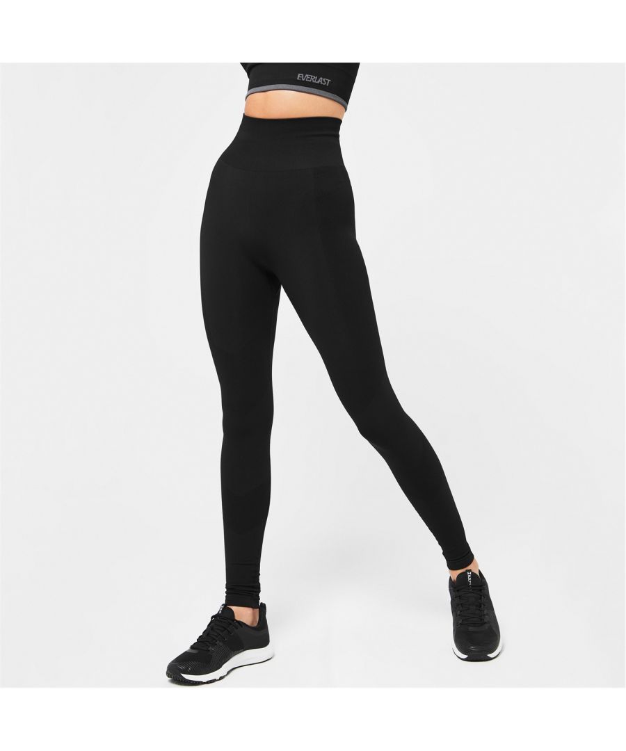 Everlast Super High Waisted Racer Leggings Feel flexible, comfortable and supported with these Everlast super-high waisted racer leggings. Equipped with our signature seamless technology, these leggings are fully flexible allowing for ultimate mobility and movement. Plus the sweat wicking technology will keep you dry during your workout, in a squat proof design. These are a slim fit, flattering any figure this season.  >High rise  >Seamless  >Sweat wicking  >Slim fit  >Squat proof  >Original 90% Nylon 10% Elastane  >New style: 92% Nylon 8% Elastane  >Machine washable