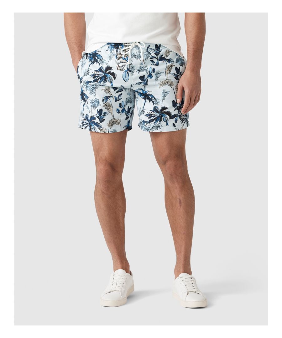 When you can't travel to the tropics, bring the tropics to you. These eye-catching swim shorts are cut from a lightweight, recycled-polyamide fabric, milled in Europe. Cut in a universally flattering 9' mid-length.