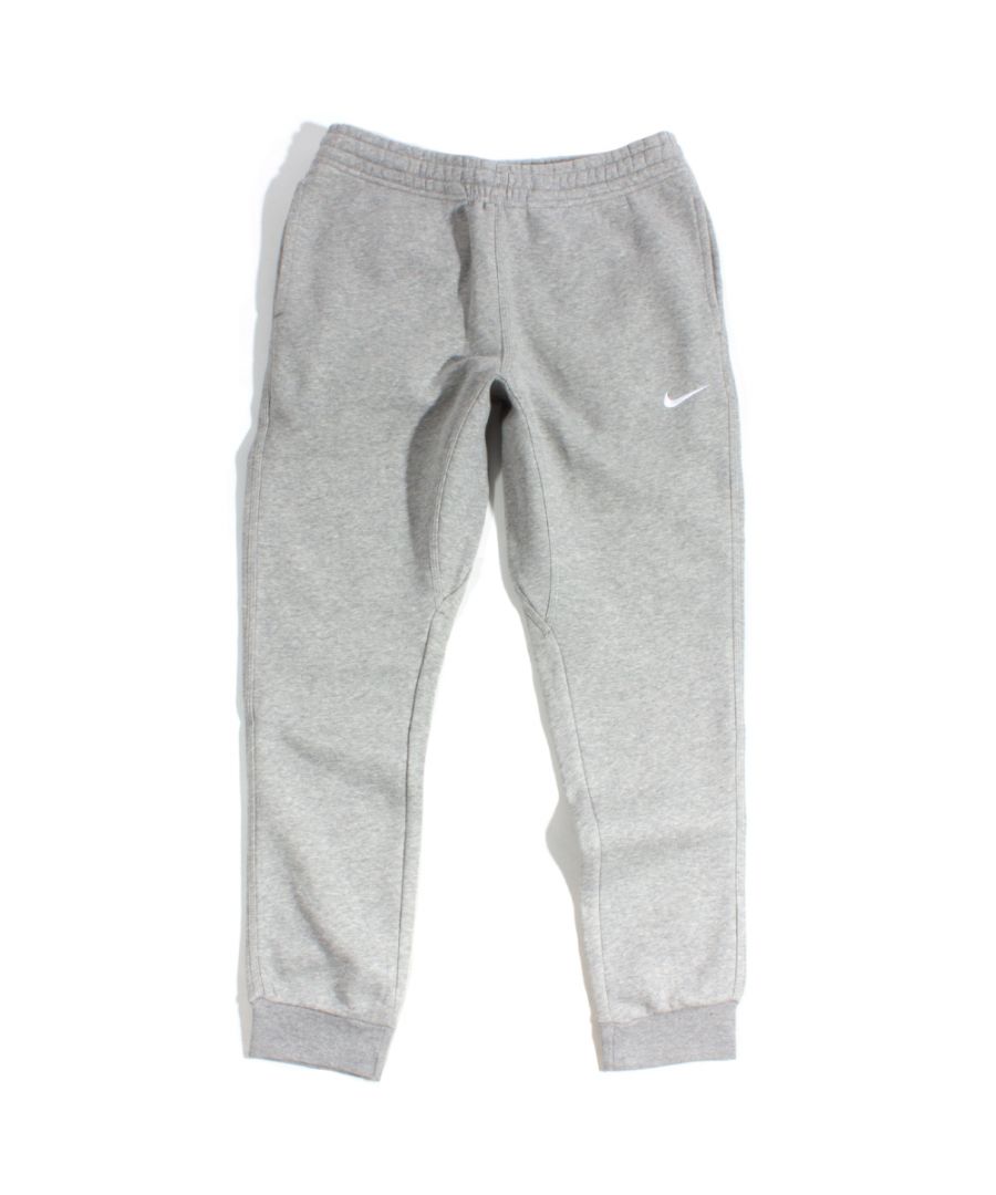 The Nike Sportswear Club fleece sweatpants combine classic style with the soft comfort of fleece. Soft comfort: brushed-back fleece is soft and smooth. Secure fit, elastic waistband with an adjustable drawcord lets you personalise the fit. Elastic at the cuffs let you show off your kicks.