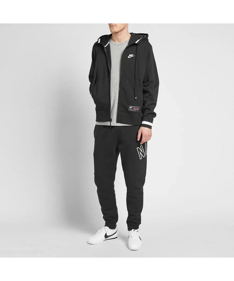 Nike Air Mens Zip Through Tracksuit Set in Black.  \nDrawstring Hood, Zip Closure, Embroidered Swoosh.   \nPrinted Branding, Split Kangaroo Pouch Pocket.   \nWoven Brand Patch, Ribbed Cuffs & Hem.  \nElasticated Waist Band.   \nElasticated Drawstring Waist Joggers.   \nRibbed Bottom Leg Cuffs for Comfort Fit.