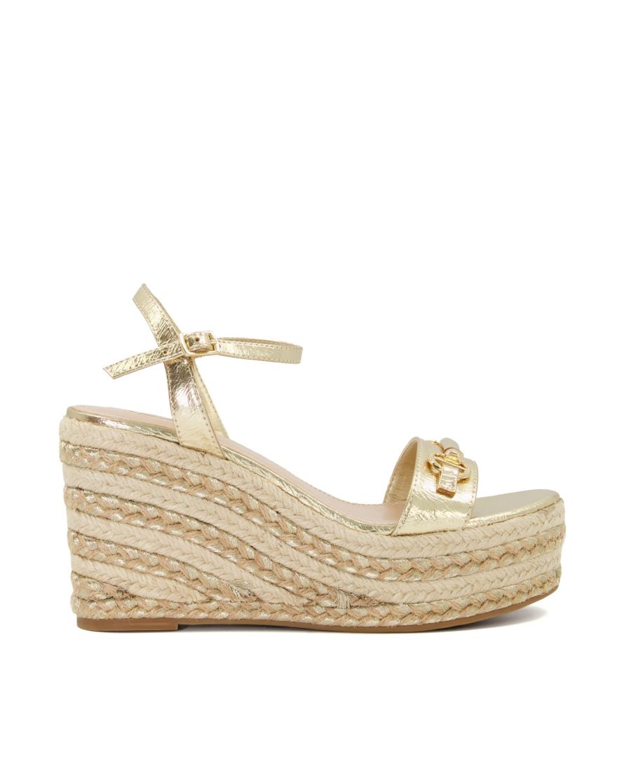 Our Kiss wedge sandals boast boho-luxe appeal. Crafted in-house, they rest on a high woven wedge