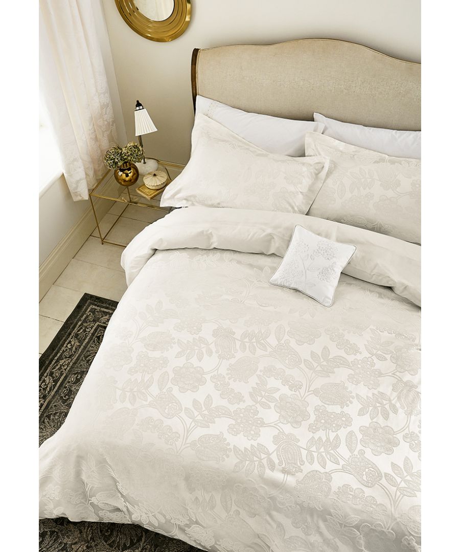 Letty captures the elegance and sophistication of the 20's with its stylised, intricate floral and branch motif woven in a palette of soft, Porcelain tones. The cotton/ polyester blend creates a subtle texture but also offers a soft to the touch handle. White embroidered pillowcases add the perfect contrast and the range includes a quilted throw, one size of curtains (66x72
