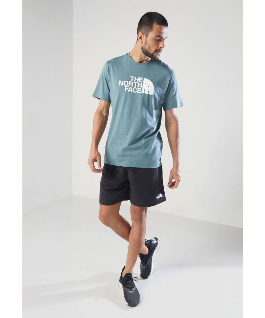 The North Face Mens Short Sleeve Easy Tee.     \nPressed Plastisol Print at Front.     \nThe North Face Logo on the Back of the Shoulder.     \nClassic Length Short-sleeve T-shirt With Crew Neck.      \n100% Cotton.     \nMachine Washable (Please See Care Label).     \nThe North Face Mens T Shirt TNF Short Sleeve Crew Neck Cotton Casual Easy Tee.