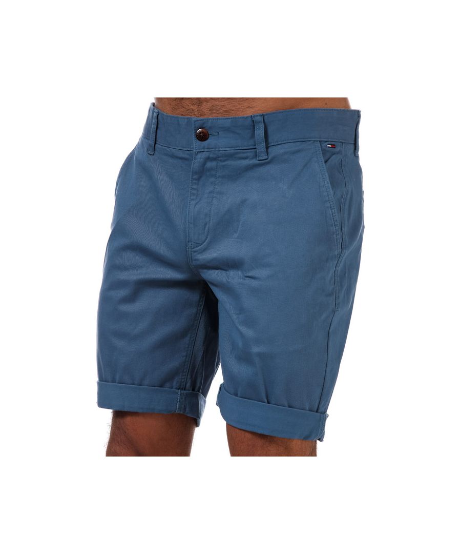 Mens Tommy Jeans Scanton Chino Shorts in audacious blue.- Zip fly and button fastening. - Front slant pockets.- Buttoned rear welt pockets.- Embroidered Tommy Jeans flag patch at front left pocket and rear right pocket.- Turn up hems.- Comfortable stretch cotton twill construction.- Regular fit.- 98% Cotton  2% Elastane. Machine washable. - Ref: DM0DM05444CZY