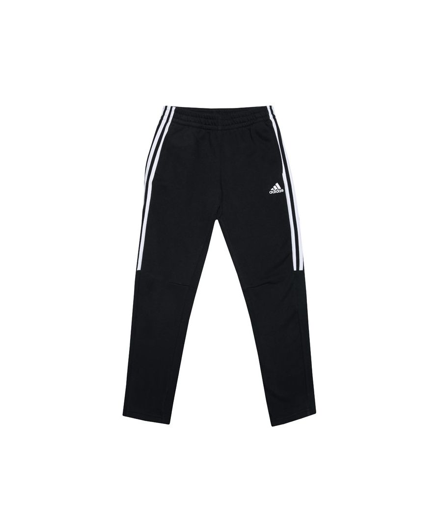 Junior Boys adidas 3S Tiro Jog Pants in black.- adidas logo to the left leg.- Two open side pockets.- Inner drawstring to the waist.- Iconic 3-Stripes branding.- Contrast ribbed detailing.- 70% Cotton  30% Polyester. Machine washable.- Ref: DV0792