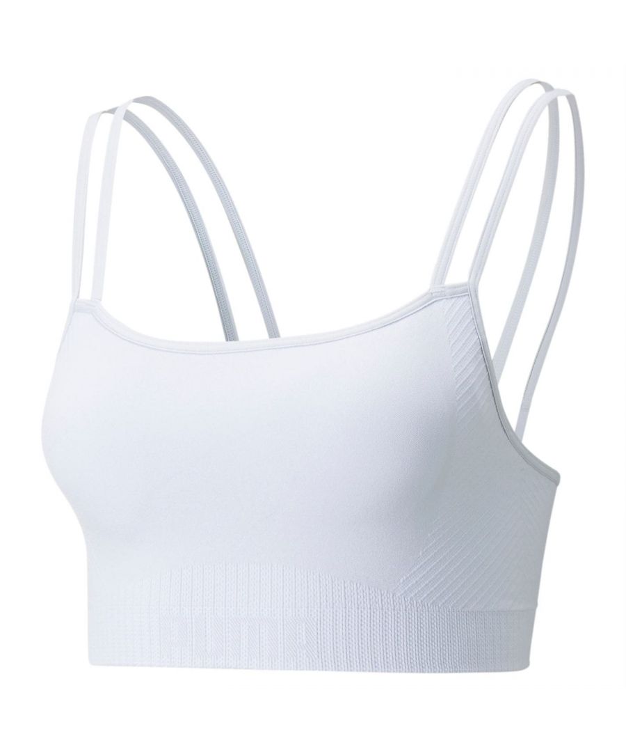 Puma Formknit Bra Ladies > This Puma Formknit Bra is crafted in a seamless construction. With an engineered knit structure to provide a performance fit, the bra includes breathability technology alongside a moisture wicking build to help keep you dry and comfortable. With low impact support, removable padding and double straps, the piece is finished with the Puma branding on the band. A must have for your gym wear.