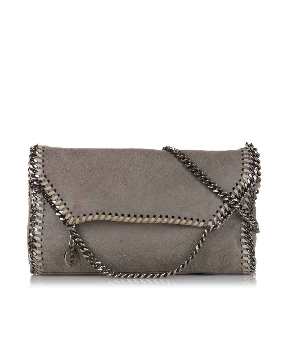 VINTAGE. RRP AS NEW. The Falabella crossbody bag features a faux leather body, a silver-tone chain strap, a front flap with magnetic snap button closure, and an interior slip pocket.Exterior Front Discolored. Exterior Back Discolored. Exterior Front Discolored. Exterior Back Discolored. \n\nDimensions:\nLength 15cm\nWidth 23cm\nDepth 4cm\nHand Drop 6cm\nShoulder Drop 52cm\n\nOriginal Accessories: Dust Bag, Authenticity Card\n\nSerial Number: 364519 W9132 SP16\nColor: Gray\nMaterial: Fabric x Others x Metal x Brass\nCountry of Origin: Italy\nBoutique Reference: SSU173515K1342\n\n\nProduct Rating: GoodCondition\n\nCertificate of Authenticity is available upon request with no extra fee required. Please contact our customer service team.