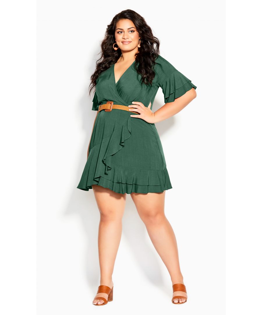 Ruffled to perfection, have some fun this season in the aptly named Fiesta Fun Dress. Perfect for cocktails with the girls and casual weekend engagements, this faux-wrap dress features flirty short sleeves, and a tie waist to flaunt your gorgeous curves. Key Features Include: - Faux wrap V-neckline - Short sleeves with tiered ruffle detailing - Elasticated back waist - Removable matching self-tie belt - Belt loops - Faux wrap skirt with ruffle trim - Pull over style Take your look to the next level by pairing with tan leather block heels and statement earrings.