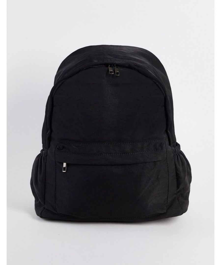 Backpack by ASOS DESIGN Pack it up Top handle Adjustable straps Two-way zip fastening External zip pocket Comes with a laptop sleeve  Sold By: Asos
