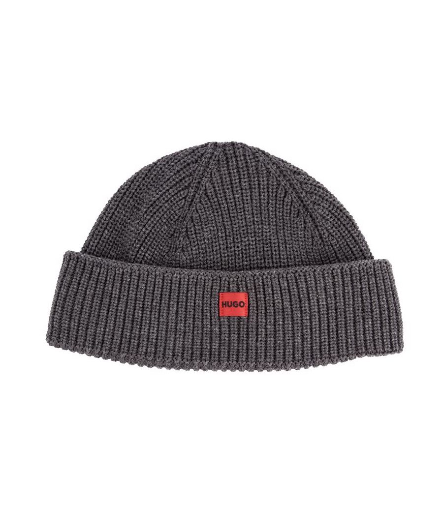 The Hugo Xaro Beanie Hat Will Keep Your Head Warm And Adds Some Hugo Style To Your Look. The Beanie Has A Turn Up Brim With A Striking Orange Designer Label.