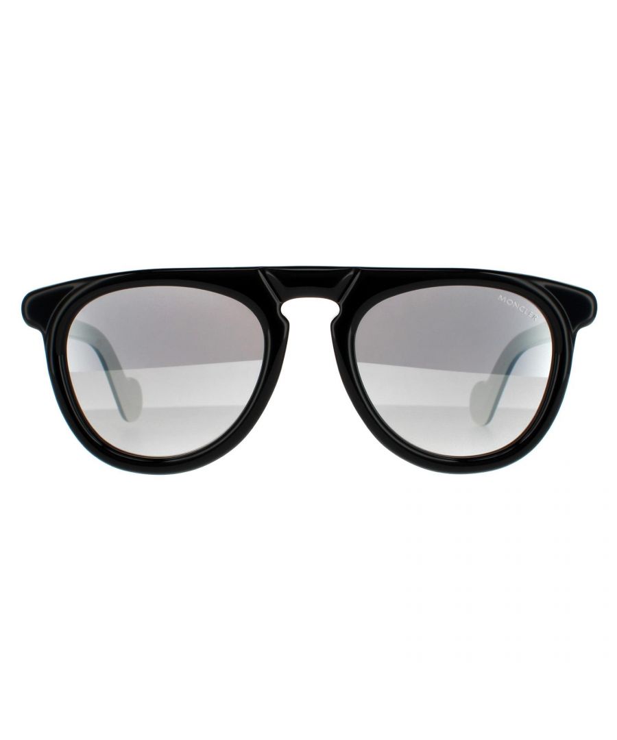 Moncler Sunglasses ML0100 04C Black White Smoke Mirror are a thick rimmed pilot shape, with a flat frame top and retro keyhole bridge. The Moncler logo decorates the temples and the signature rounded tips complete the look.