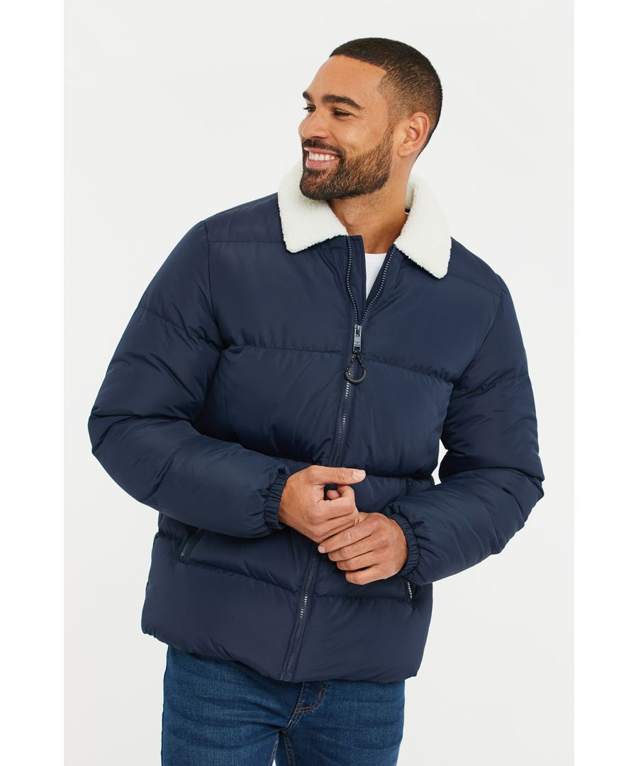 This puffer style jacket from Threadbare features full zip fastening and has a borg, collared neck. There are two zip up front pockets and this style is finished with the brand logo on the left arm. Other colours available.