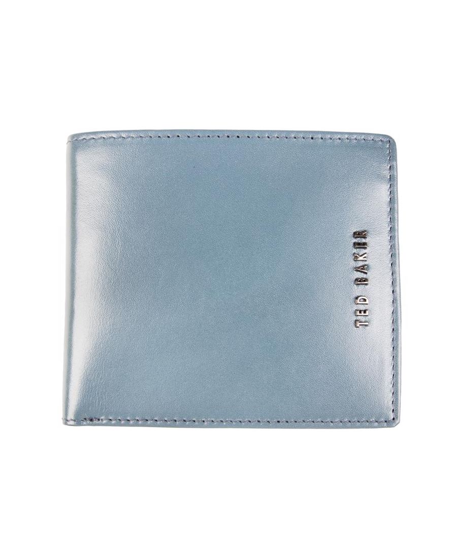 Mens blue Ted Baker sammed wallet, manufactured with leather. Featuring: front branding, 14 card sleaves, twin note sections, presentation box and height 9cm x width 10cm x depth 3cm.