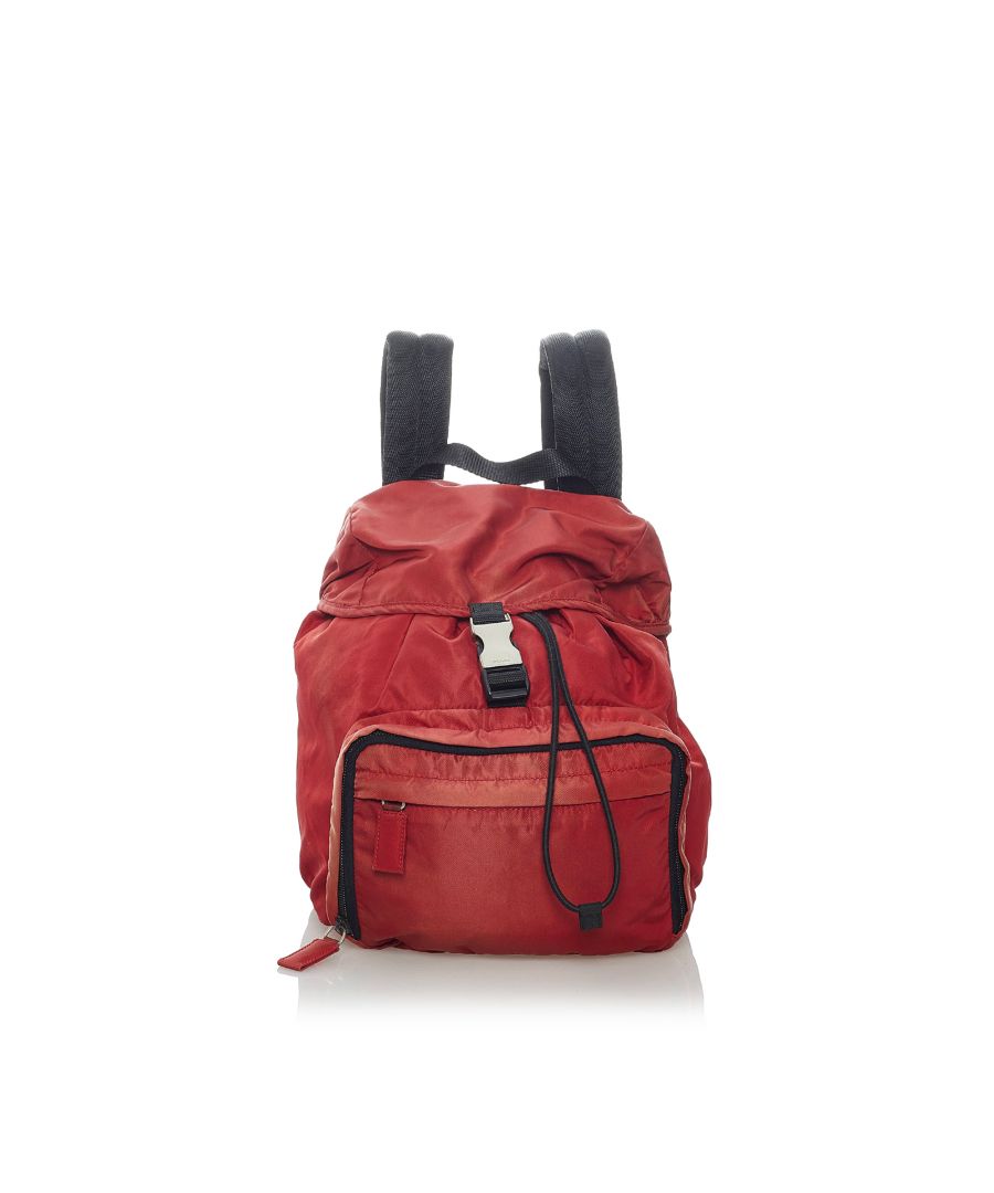 VINTAGE. RRP AS NEW. This backpack features a nylon body, an exterior front zip pocket, flat back straps, a top flap with a buckle closure, a top drawstring closure, and an interior zip pocket.Exterior back is discolored and out of shape. Exterior bottom is discolored and out of shape. Exterior front is discolored and out of shape. Exterior handle is discolored, out of shape and scratched. Exterior side is discolored and out of shape. Lock is scratched. Zipper is scratched. Interior lining is discolored. Interior pocket is discolored.\n\nDimensions:\nLength 22cm\nWidth 23cm\nDepth 9cm\nShoulder Drop 93cm\n\nOriginal Accessories: This item has no other original accessories.\n\nColor: Red\nMaterial: Fabric x Nylon\nCountry of Origin: Italy\nBoutique Reference: SSU163630K1342\n\n\nProduct Rating: GoodCondition\n\nCertificate of Authenticity is available upon request with no extra fee required. Please contact our customer service team.