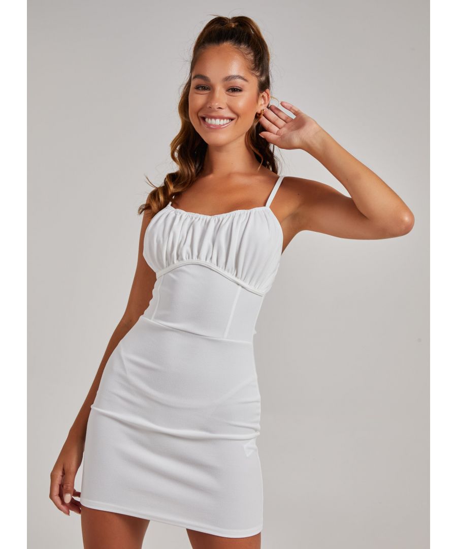 Streamline your curves with this figure-flattering bodycon dress. From everyday staple to a party fitted style, this dress is versatile to keep you stylish from the AM to PM. 95% Polyester, 5% ElastaneMade in the UKWash With Similar ColoursIron On ReverseDo Not Dry CleanModel wearing size 6Model height: 5'8