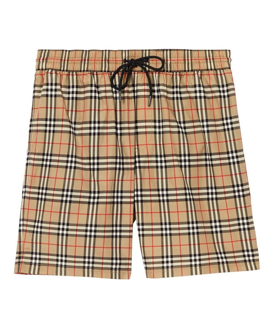Life's a beach. Make sure you dress accordingly with these Vintage Check print swim shorts from Burberry. Pair them with some sunscreen and a good book for peak relaxation.
