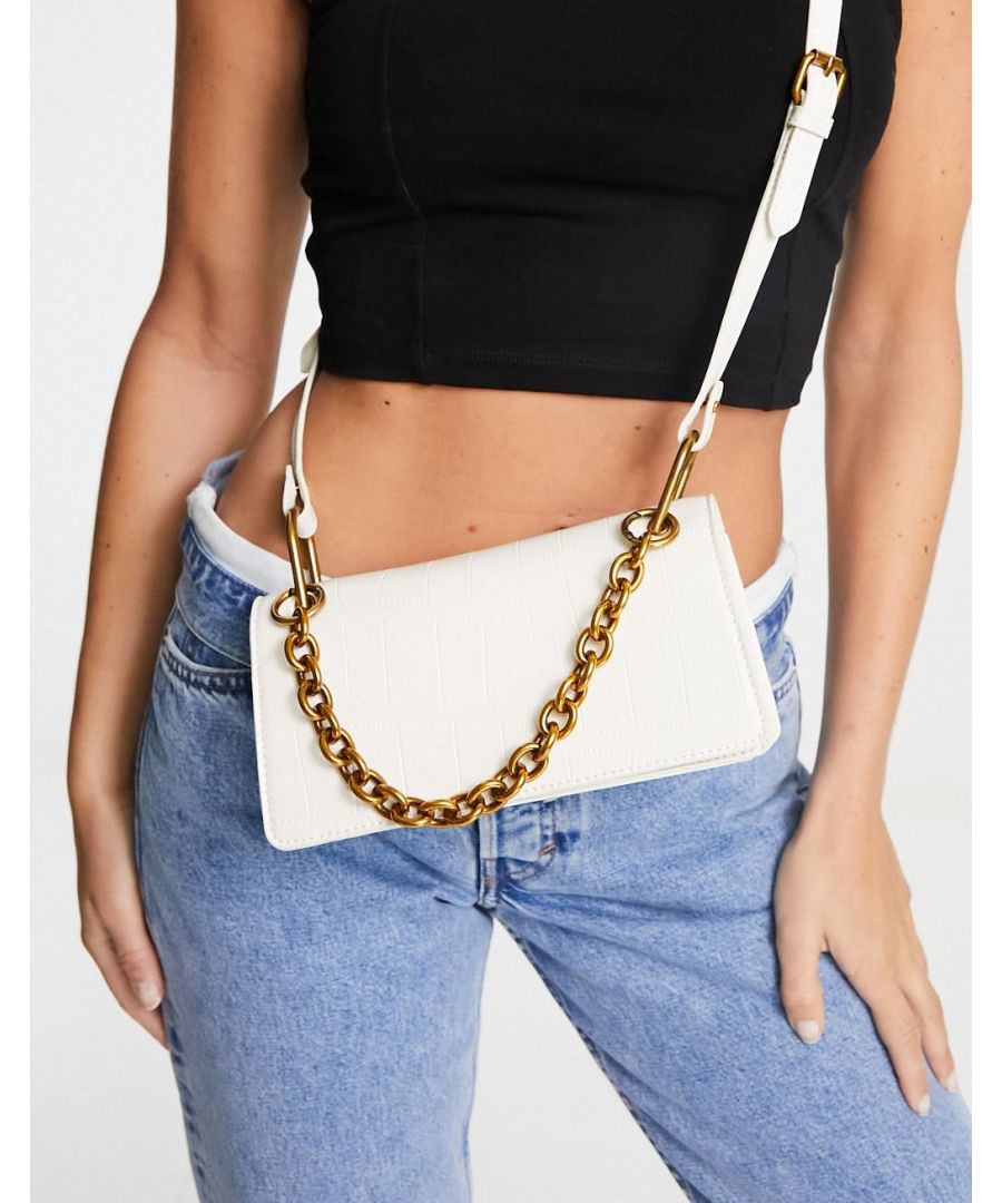 Cross-body bag by ASOS DESIGN Can you fall for a bag? Mock-croc design Detachable chain handle Adjustable strap Can be worn on the shoulder or across the body Fold-over flap top Magnetic closure Internal pocket Sold by Asos