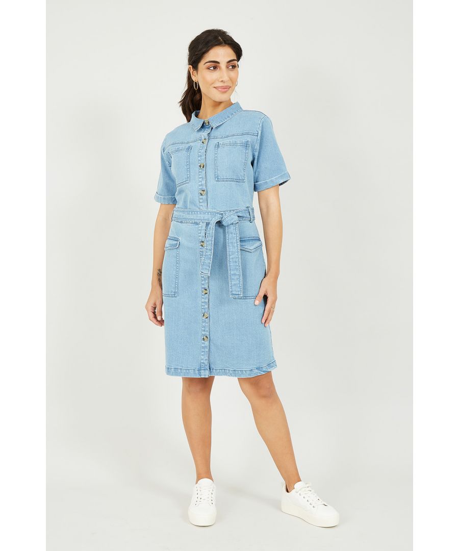 In a gorgeous pale blue denim, this dress features four pockets, a statement button through fastening, short sleeves, a shirt style pointed collar and waist accentuating self-tie belt, this stunning cotton Yumi Blue Stretch Denim Utility Shirt Dress is a fit for any occasion.
