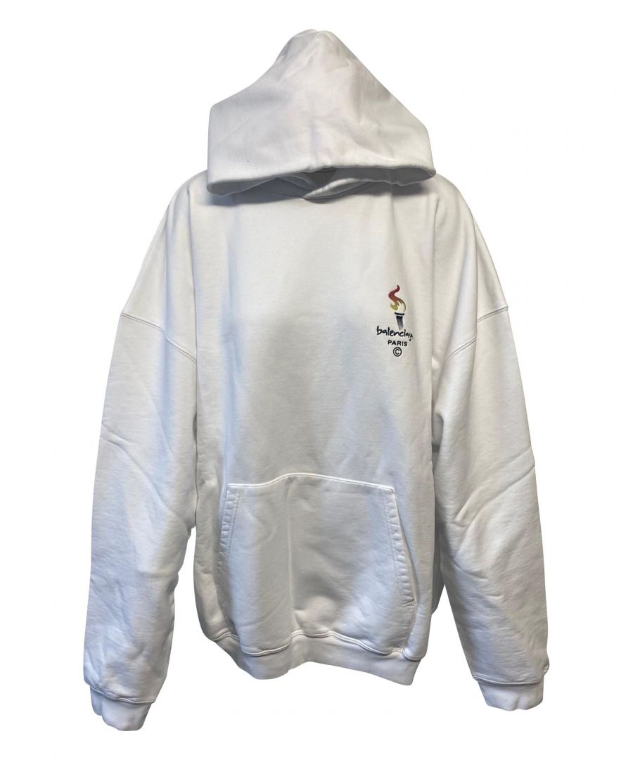 VINTAGE, RRP AS NEW\nLogo hoodie by Balenciaga rendered in a cotton-blend featuring an over-sized silhouette, hood, dropped shoulders, long sleeves, kangaroo pocket, ribbed trims, logo detail and a straight hem. Coordinate it with black jogger pants and low-top sneakers for a relaxed on-campus edit.\nBalenciaga Olympic Hoodie in White Cotton\nColor: white\nMaterial: Cotton\nCondition: excellent\nSize: S\nSign of wear: No\nSKU: 76311   \nDimensions:  Length: 940 mm\nBalenciaga Balenciaga Olympic Hoodie in White Cotton\nColor: white\nMaterial: Cotton\nCondition: excellent\nSize: S\nSign of wear: No\nSKU: 83196 / HNDOGBCL076311M / HNDOGBCL076311M \nDimensions:  Length: 940 mm