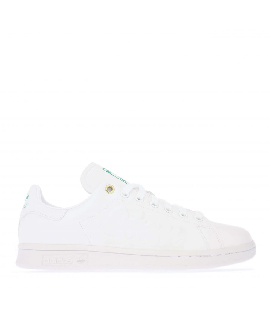 Womens adidas Originals Stan Smith Trainers in white green.- Synthetic upper.- Lace fastening.- Regular fit.- Contrast heel patch with debossed Trefoil branding.- Smith’s face on the tongue. - Represent the 3-Stripes heritage.- Rubber outsole.- Synthetic upper  Textile lining  Synthetic sole.- Ref.: FY5464