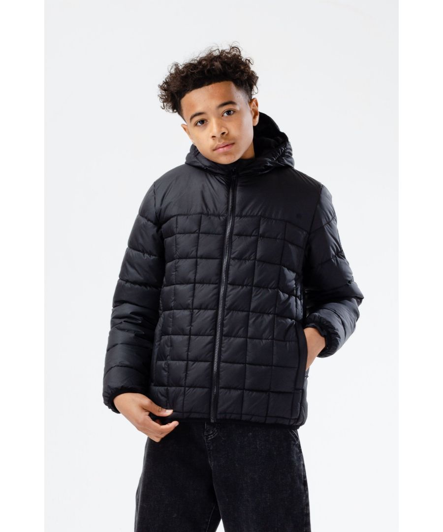Meet the HYPE. Kids Baffled Casual Jacket, part of the HYPE. 2022 Back to School collection. Designed in our classic kids? baffled casual jacket shape in black. Boasting a front zip, hood, side pockets, and the HYPE. crest logo on the sleeve. Don't just keep warm and cosy in these colder months, do it with style. Machine washable.
