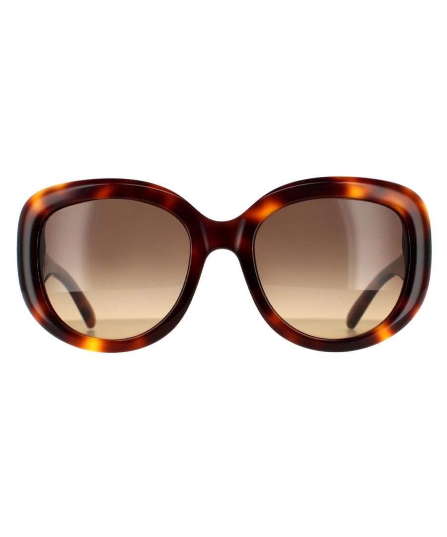 Salvatore Ferragamo Oval Womens Tortoise Brown Gradient Sunglasses SF727S are a modern oval style crafted from lightweight acetate. The Salvatore Ferragamo logo features on the temples for brand authenticity