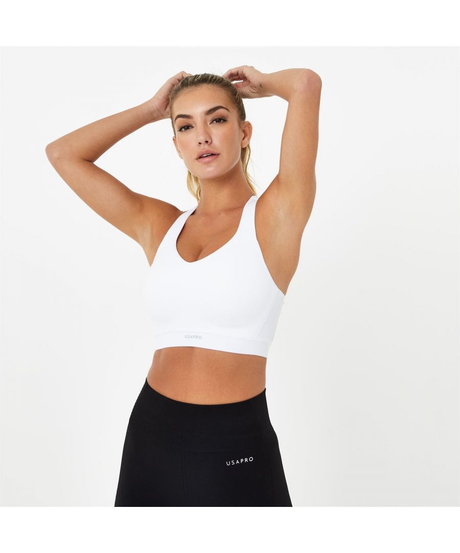 Extreme workouts require extreme support, the USA Pro high support sports bra is crafted with adjustable crossover straps for complete impact when performing high intensity exercises. This design is finished with a hook and eye fastening and padded bust for complete security as you sweat it out.