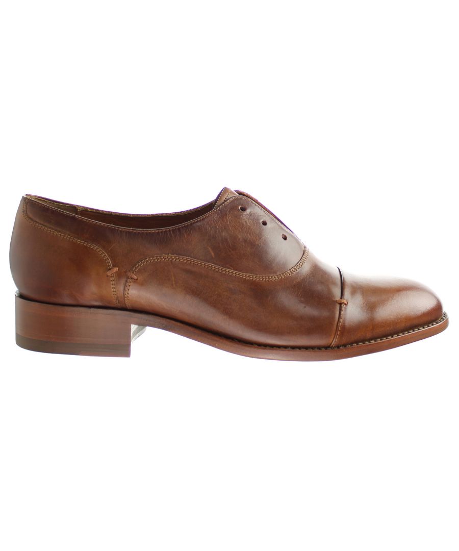 A quintessential women’s Oxford shoe with impeccable attention to detail. The Austen is a wardrobe must-have. An elegant leather outsole and beautiful, full-grain leather that can be worn with or without laces to make a major statement.\nPremium hand finished, full grain leathers\nCow lined for breathability and a luxurious feel\nLeather protected Poron® layer insole for maximum wearability\nLeather outsole with injected TPU for shock absorption and slip-resistance\nLace-up access\n1